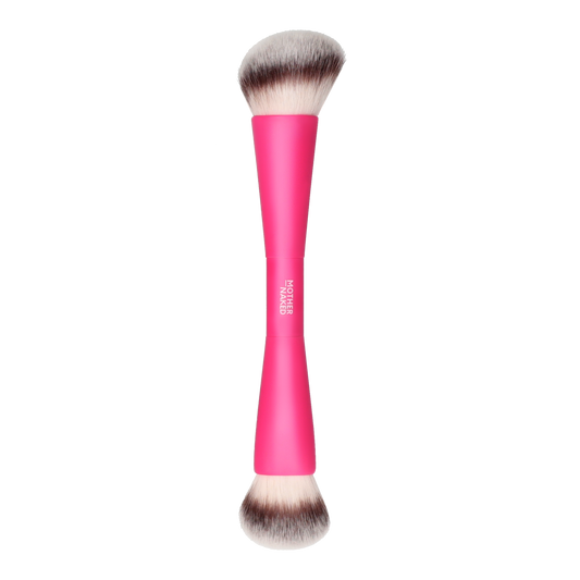 Makeup brush with pink handle on a white background